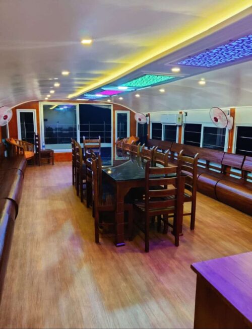 dining in upper deck at night alleppey houseboat