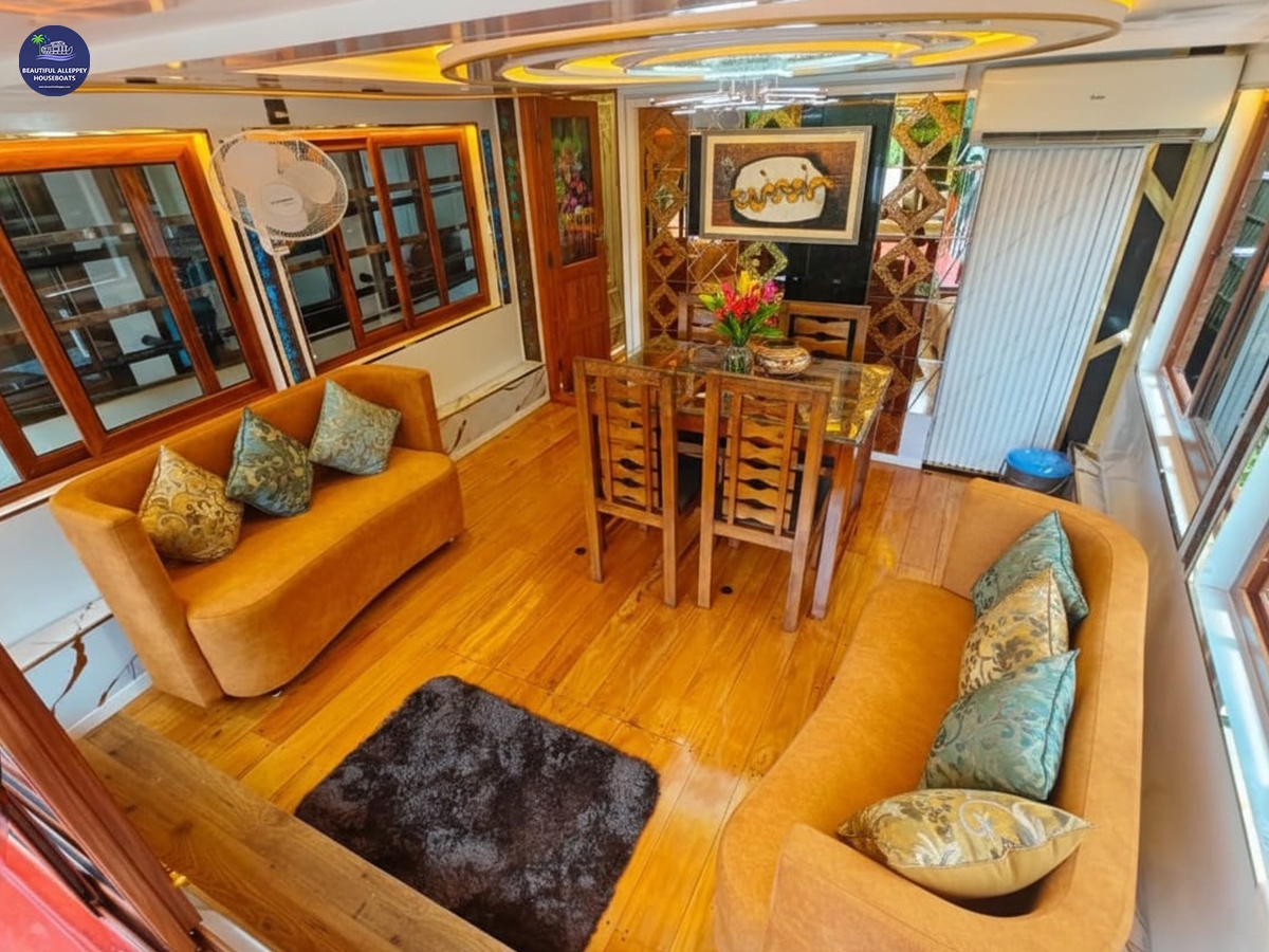 Premium-ac-houseboat-dining Glass covered ac dining in a 1 bedroom premium houseboat in alleppey