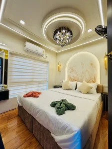 lose-up view of the premium bedding and full-time air conditioning setup inside the private bedroom of MITHRAM01 houseboat