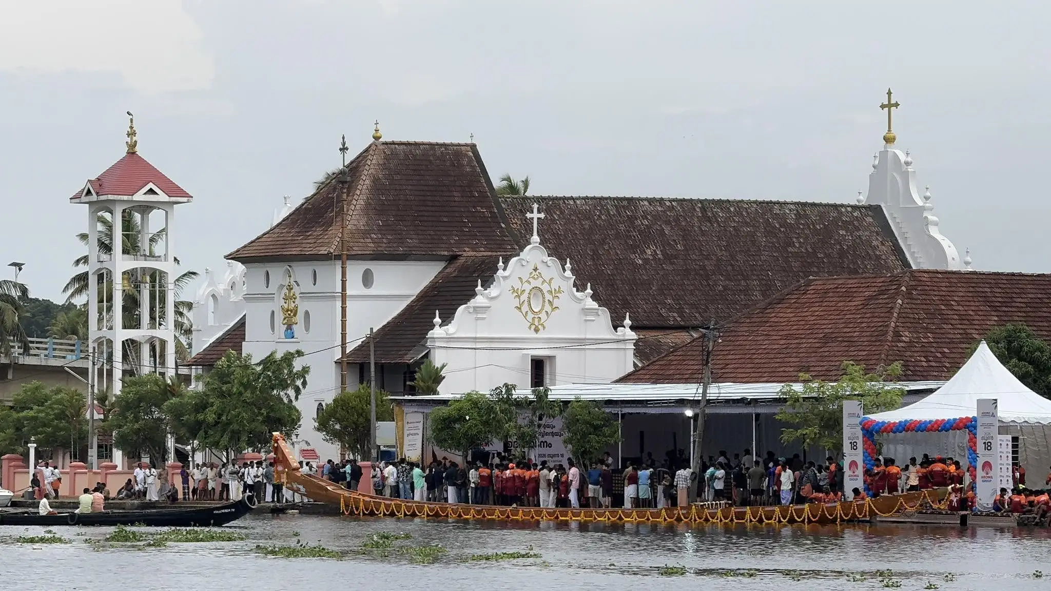 Aroma Chundan snake boat rowed by Aroma Boat Club winning the Champakulam Moolam Boat Race 2026 on Pampa River in Alleppey, Kerala.